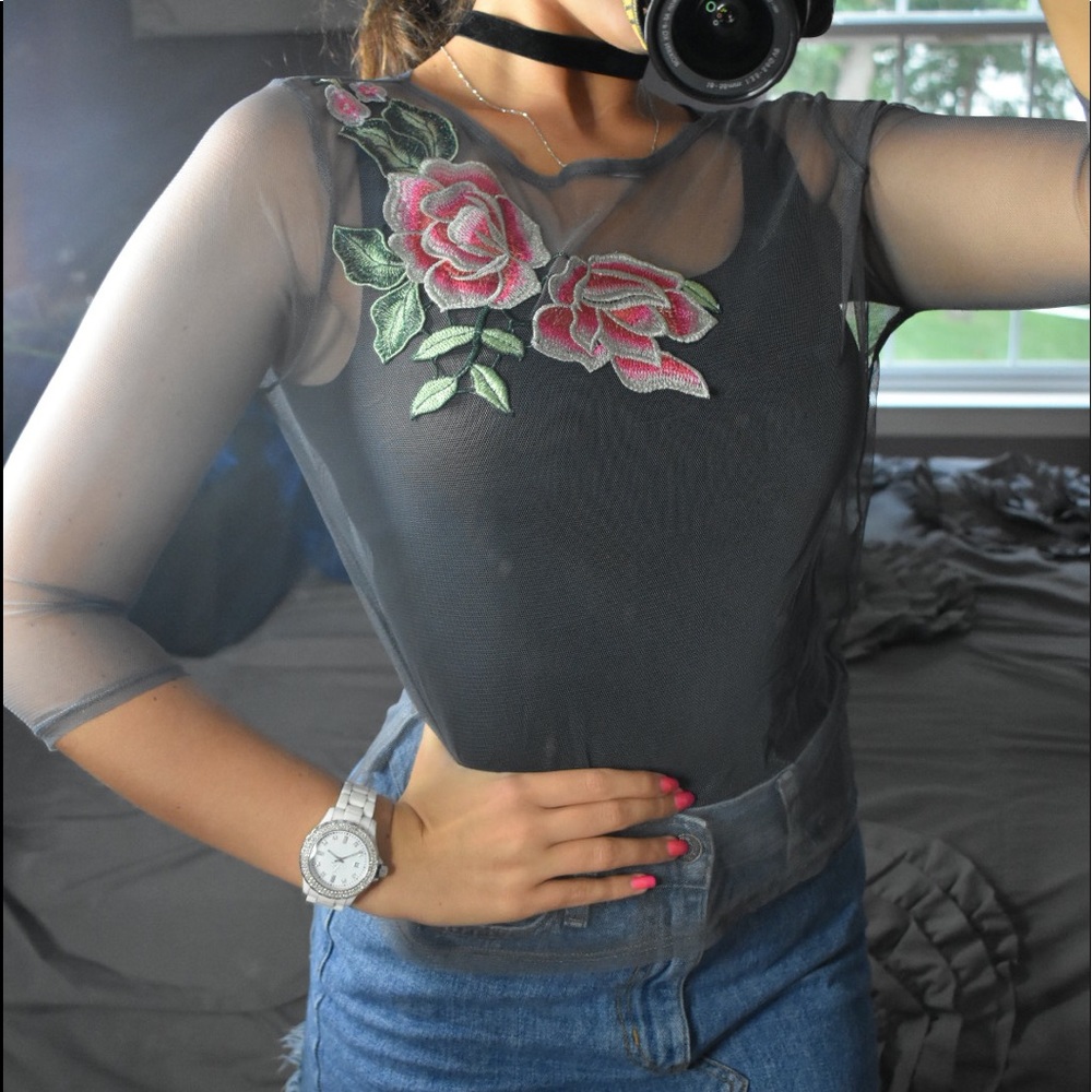Sheer top with embroidered flowers